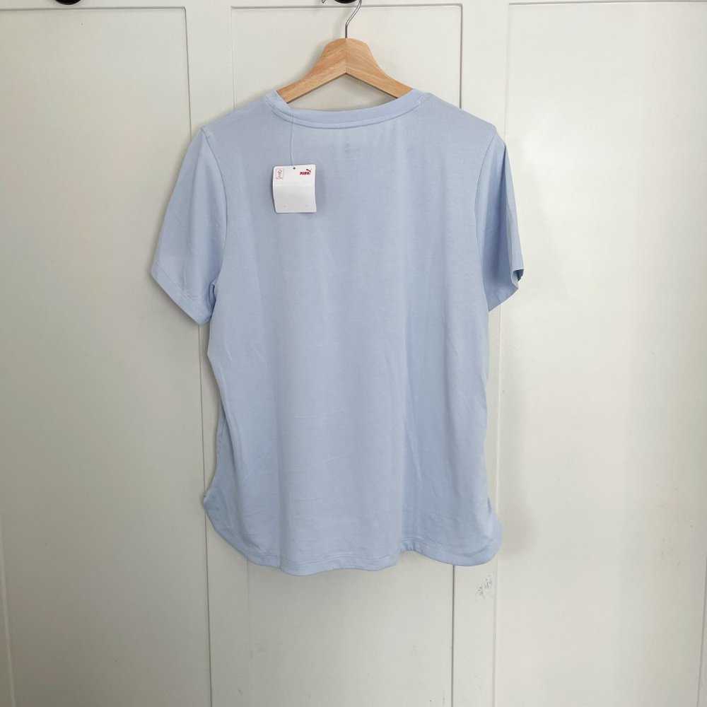 NEW Puma Women’s Curved Hem T-shirt Light Grey and Purple Short Sleeve Shirt Top Women > Tops > Tees - Short Sleeve 18 $ Buttons & Beans Co.